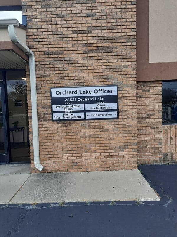 Directory sign of Orchard Lake Offices