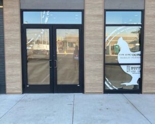 Custom graphics on glass window made by SignScapes